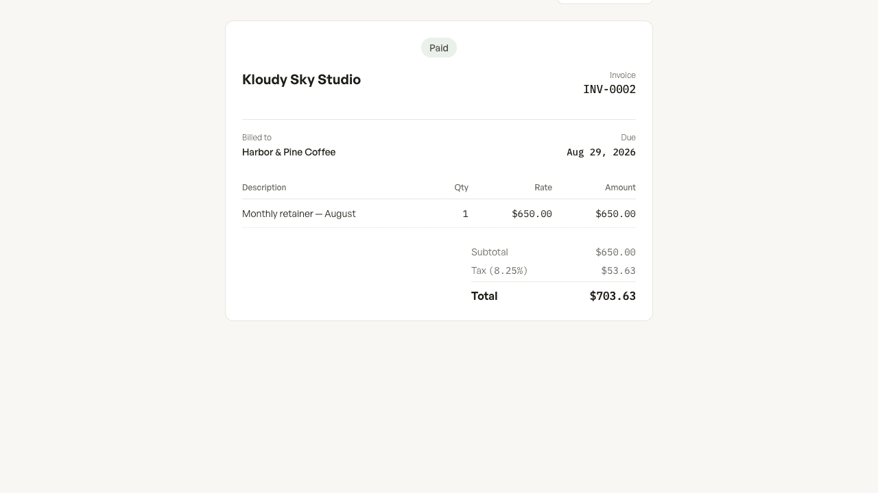 The public invoice page marked Paid